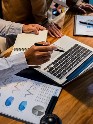 Administrator business man financial inspector and secretary making report calculating balance. Internal Revenue Service checking document. Audit concept